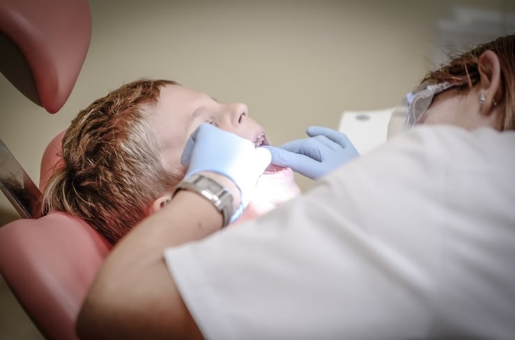 teeth cleaning by a dentist