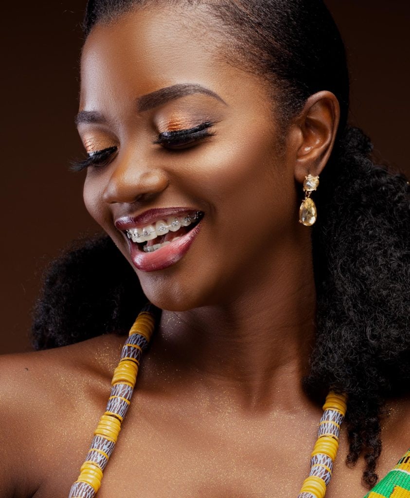 Woman with braces smiling