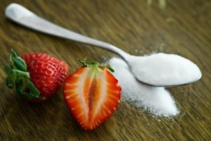 sugar on a table spoon