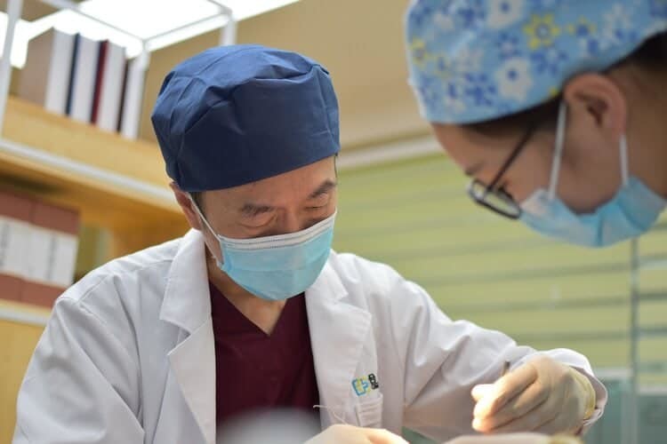 dentists working on a patient